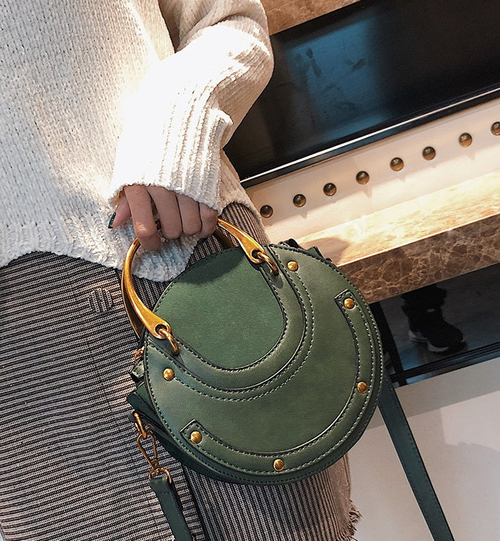 New fashion portable rivet small round bag Korean version of the female bag wild ladies shoulder Messenger bag