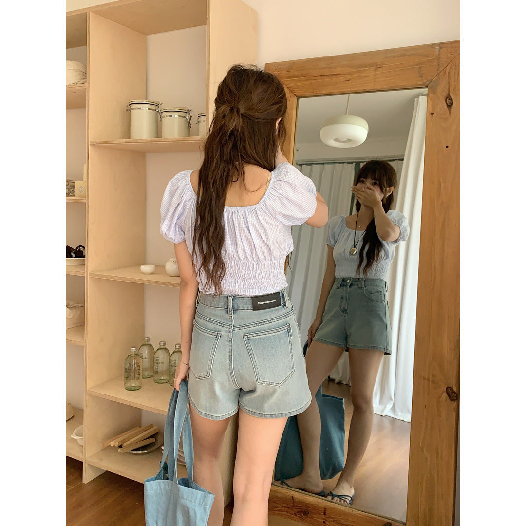 Women's Four Sided Elastic Light Colored High Waisted Denim Shorts - Chic Angle