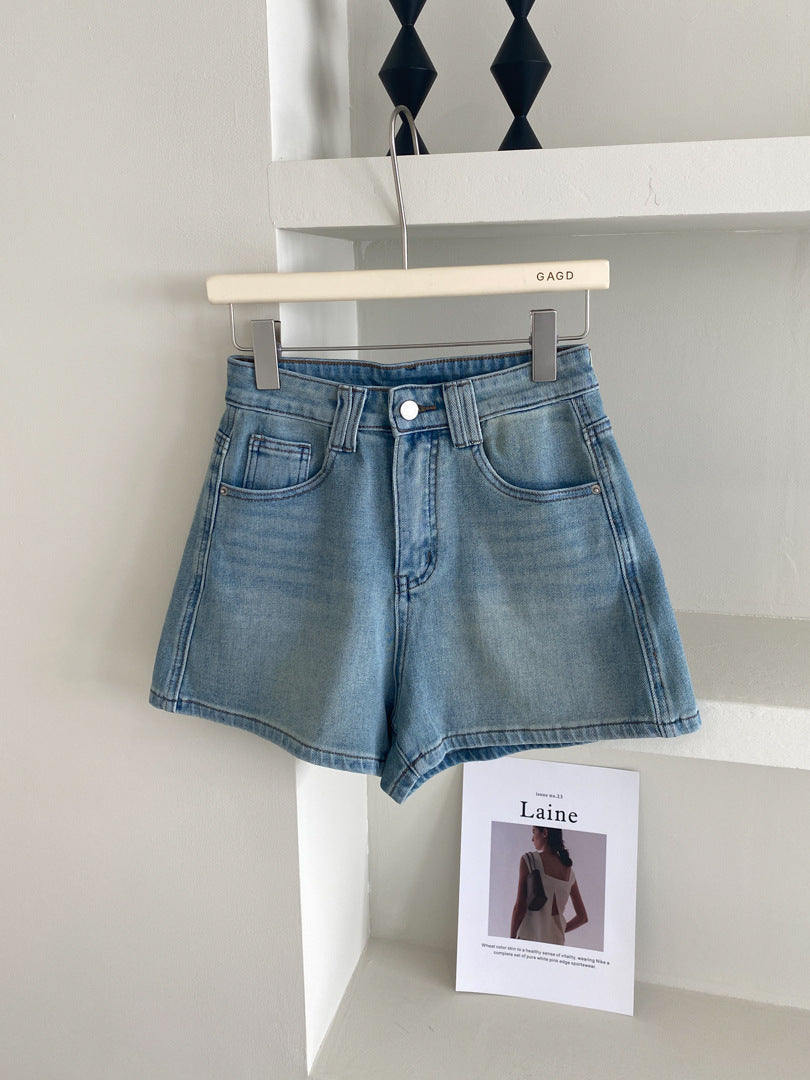 Women's Four Sided Elastic Light Colored High Waisted Denim Shorts - Chic Angle