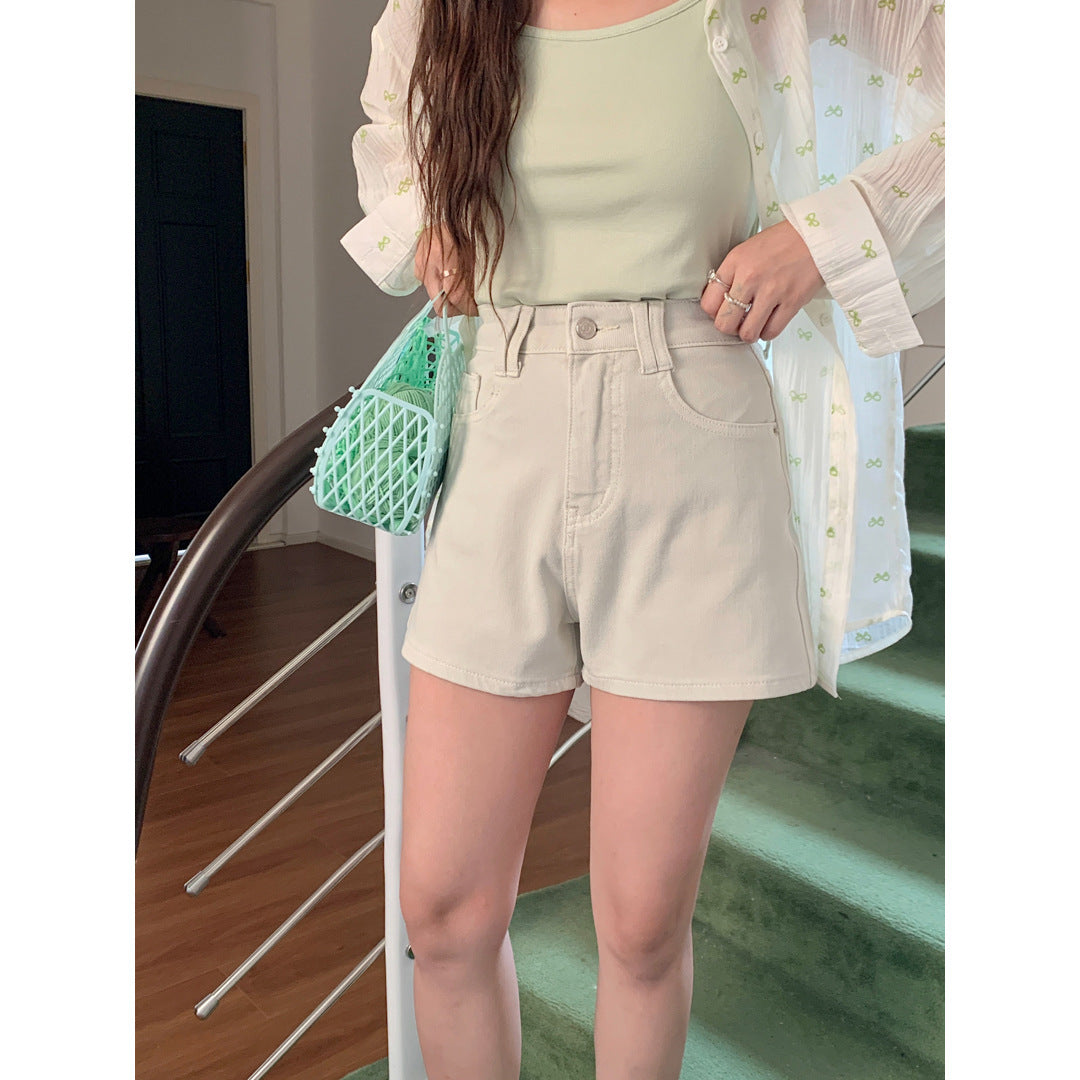 Women's Four Sided Elastic Light Colored High Waisted Denim Shorts - Chic Angle