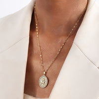 The European And American Oval Shaped Virgin Mary Pendant Necklace Exudes A Light Luxury And Niche Design Sense