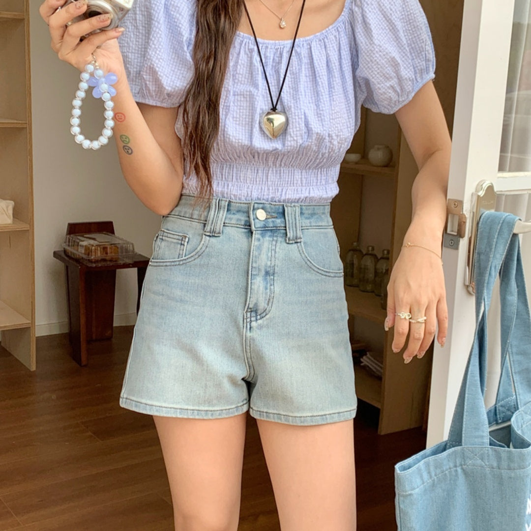 Women's Four Sided Elastic Light Colored High Waisted Denim Shorts - Chic Angle